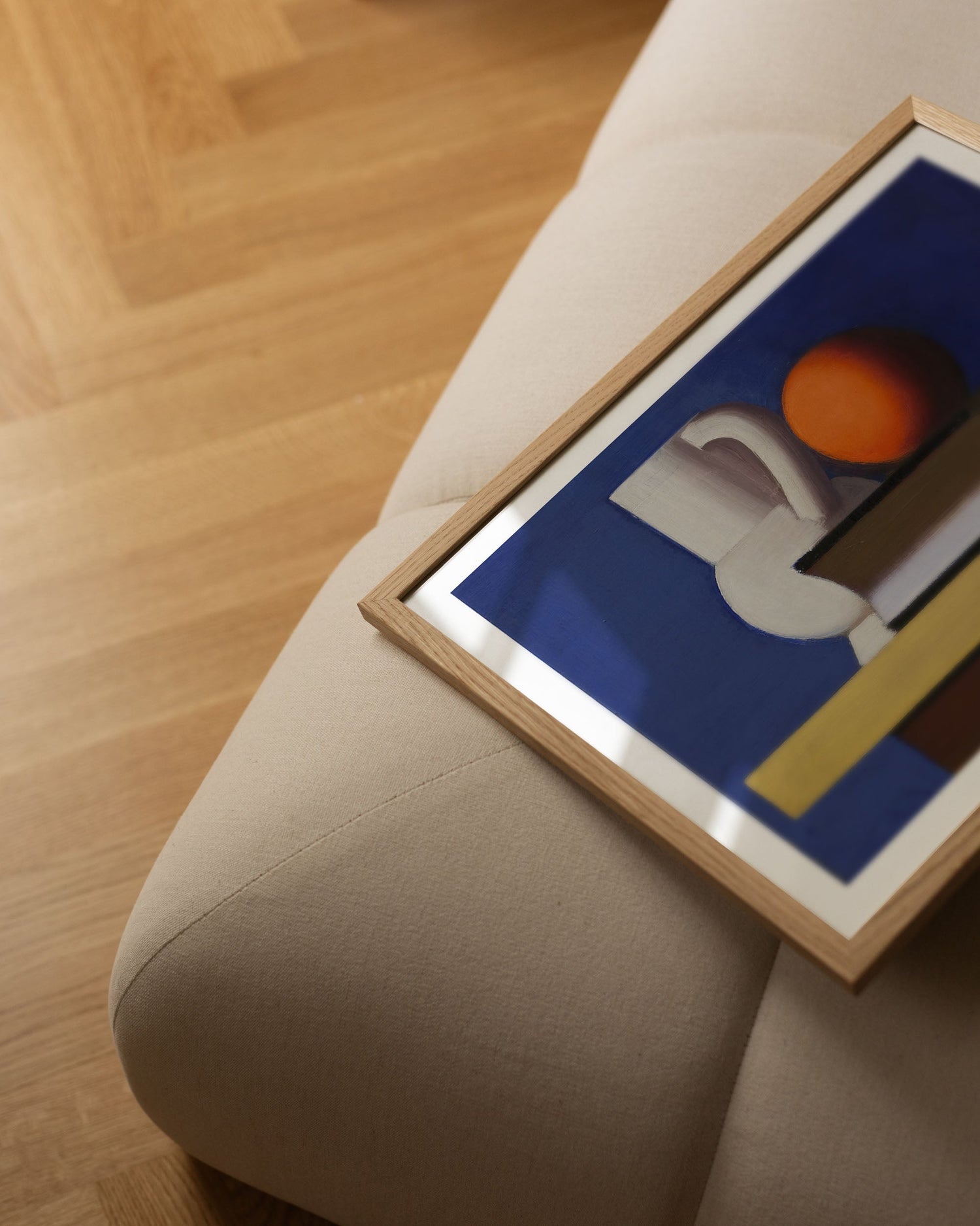 Setup with white jug, orange, and book