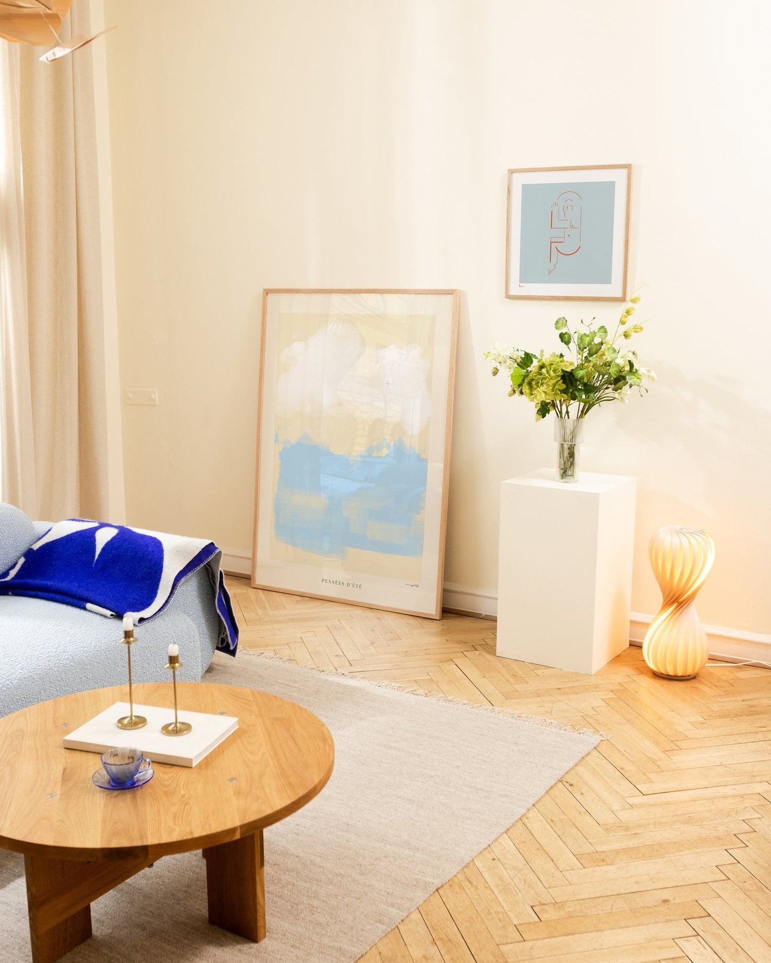 Blue art prints in living room