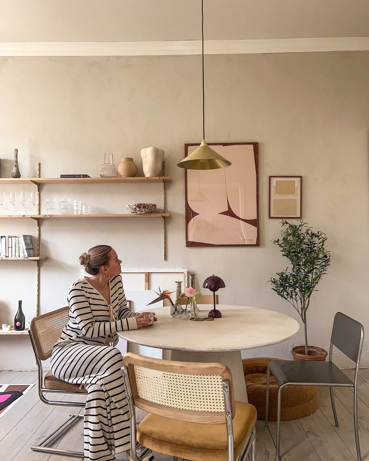 Curated poster wall with a minimalist expression