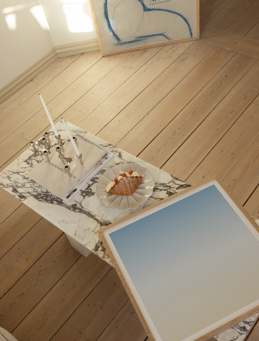 Blue art prints in living room